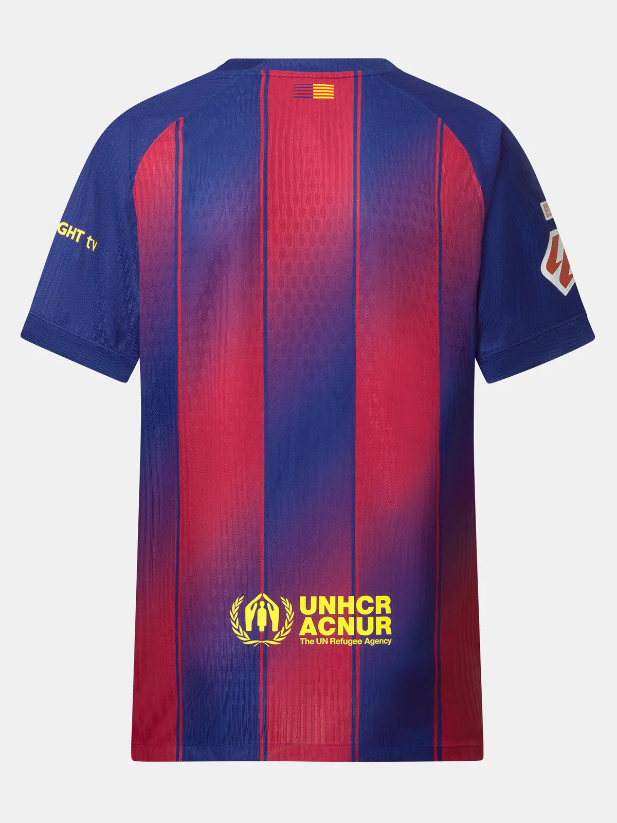OO | UAE SPORT STORE Back view of a blue and red striped jersey with short sleeves, featuring a small flag patch at the neck and the bright yellow UNHCR/ACNUR logo at the bottom center.