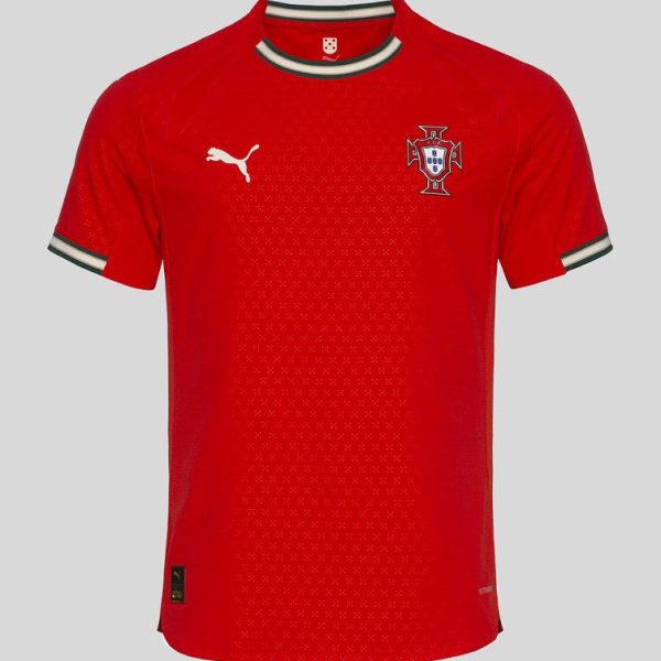 Portugal national team red soccer jersey with Puma logo and crest on chest, white and green trim on collar and sleeves