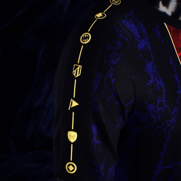 Close-up of a dark jacket sleeve with vertical gold embroidered symbols along the seam, set against a blue patterned fabric and dark background.