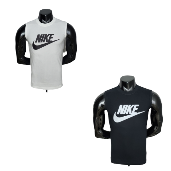 Two Nike sleeveless tank tops displayed on mannequin torsos, one white and one dark gray, each with a large Nike swoosh logo.