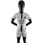 Black mannequin wearing a light gray Paris Saint-Germain football jersey with Qatar Airways sponsor and a black vertical stripe down the center.
