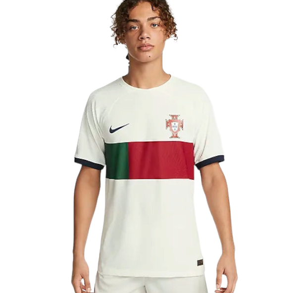 Man wearing a Portugal national team soccer jersey with a green and red horizontal panel and a Nike logo on the chest, white background