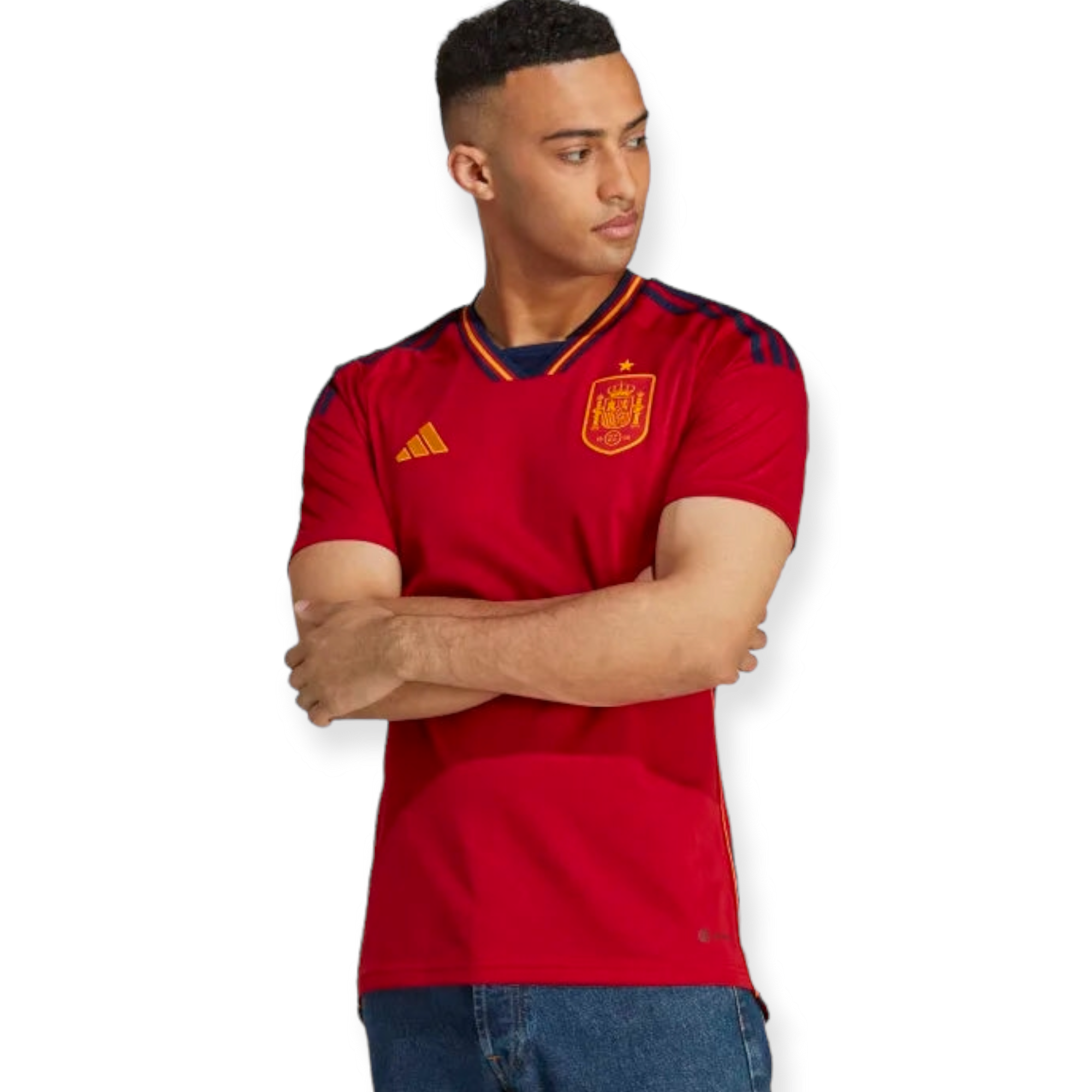 PhotoRoom-20221025_181518_8e683e48-7c4f-4b50-a05e-b3355e1b97bf Man in a red Spain national team jersey with arms crossed, looking to his right.