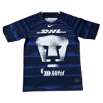 Blue striped athletic jersey with DHL and Mifel logos and a large white abstract chest emblem on the front, with a small Nike swoosh near the collar