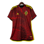Red and black striped Seattle Sounders FC jersey on a hanger with yellow trim and crest visible on the chest area.