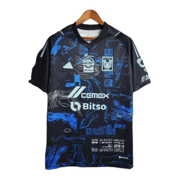 PhotoRoom-20230524_061818_78d1f3ff-4378-4ee2-b952-7530e28a3c9b - UAE SPORT STORE Dark blue graphic sports jersey on a wooden hanger with blue sponsor logos (Cemex, Bitso) and abstract designs.