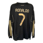Back view of a black Real Madrid jersey with 'RONALDO' and the number 7 in gold on the back, gold trim on sleeves.