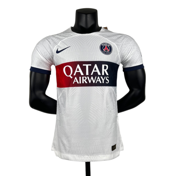White Paris Saint-Germain football jersey on a display bust, showing the PSG crest, Nike swoosh, and Qatar Airways sponsor text across the chest.
