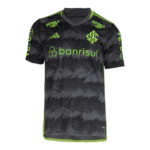Black and gray camouflage-style soccer jersey with neon green piping and sponsor logos (Banrisul, Estrela Bet) across the chest and shoulders.