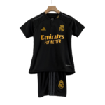 Black Real Madrid soccer jersey on a wooden hanger, featuring gold crest and Emirates Fly Better sponsor.