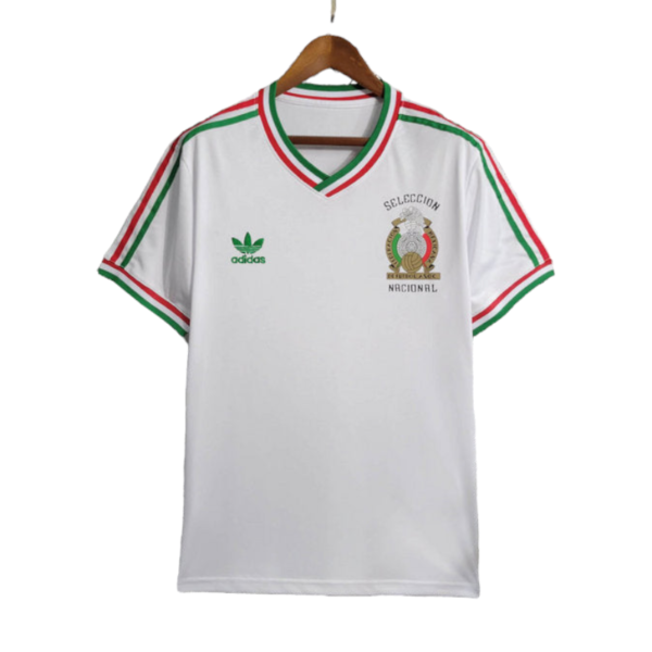 White Adidas soccer jersey with green and red trim, featuring the Mexico national team crest on the chest and logo on the opposite side.
