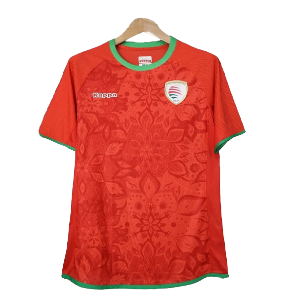 Red soccer jersey on a hanger with green trim at the collar and sleeves, featuring a Kappa logo and a team crest on the left chest.