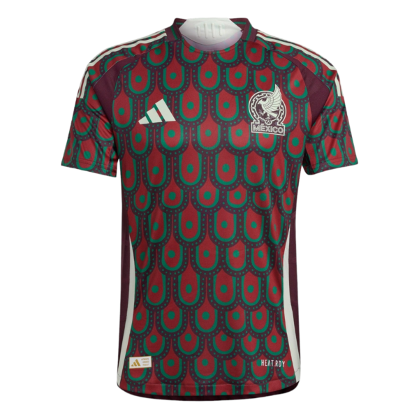 Front view of a Mexico national soccer jersey with a red and green patterned design, white Adidas logo, and the team crest reading 'MEXICO'.