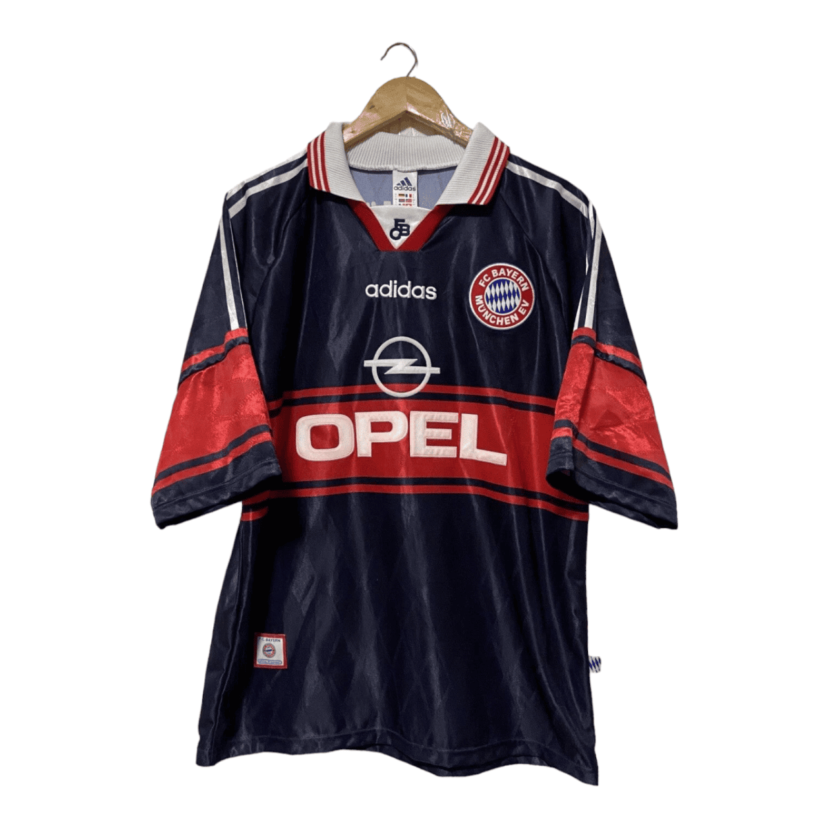 Dark blue FC Bayern Munich football jersey on a wooden hanger, featuring Adidas logo and Opel sponsor across the chest.