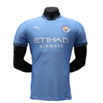 Light blue Manchester City football jersey with Puma logo and Etihad Airways sponsor displayed on a mannequin torso.