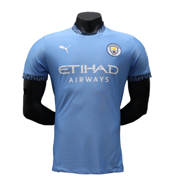 Light blue Manchester City football jersey with Puma logo and Etihad Airways sponsor displayed on a mannequin torso.