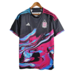 Colorful black soccer jersey with blue and pink swirls on a wooden hanger; Adidas logo on the left chest and a crest on the right.
