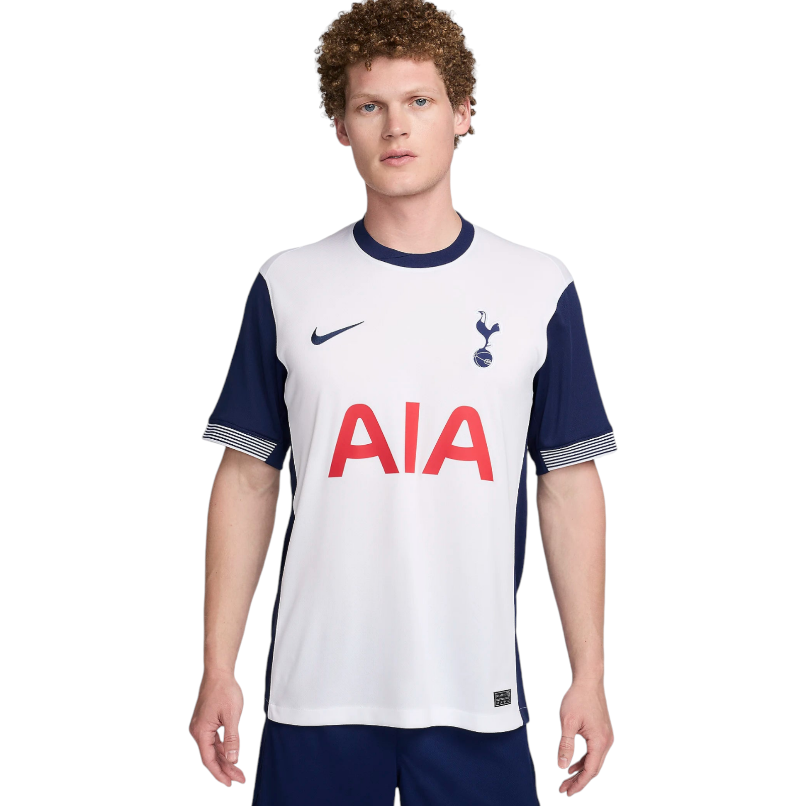Photoroom-20240717-180816 Young man wearing a white Tottenham Hotspur football jersey with navy sleeves, Nike swoosh, and AIA sponsor.