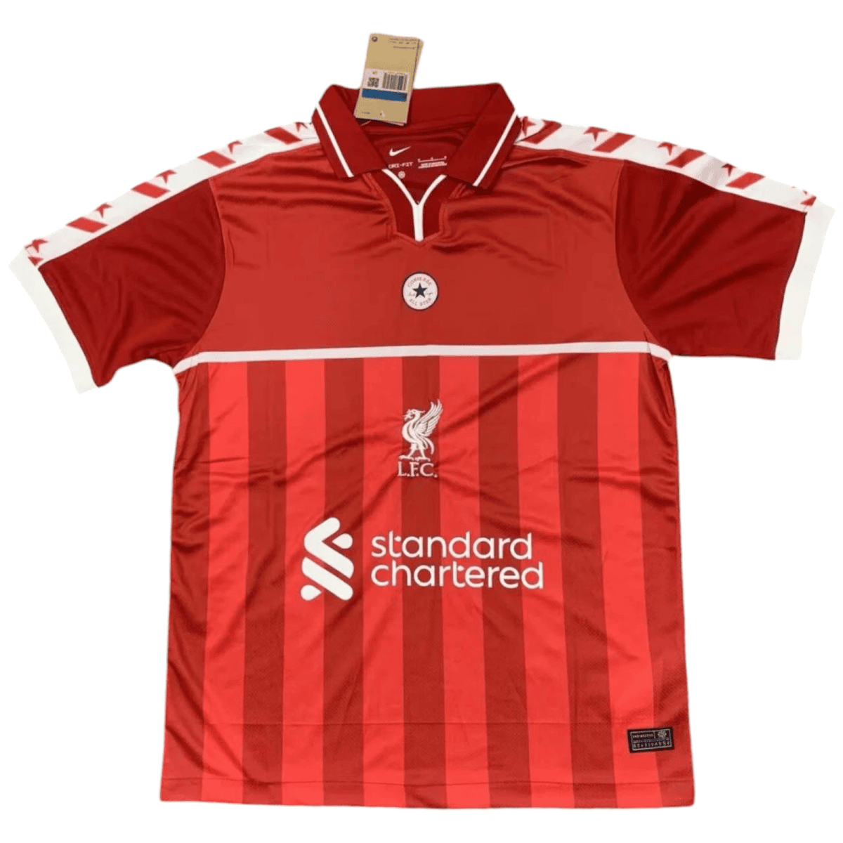 Red Liverpool FC home jersey with vertical stripes and white sponsor text 'Standard Chartered' on front.