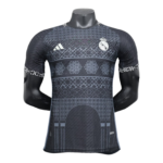 Dark Real Madrid soccer jersey on a mannequin with geometric patterns and white Adidas logo.