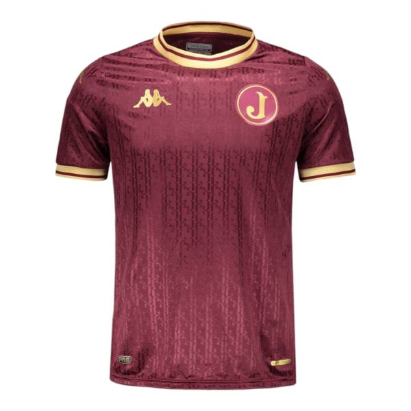 Maroon soccer jersey with gold trim and Kappa logos; circular J crest on the left chest.