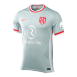 Light blue soccer jersey with red trim and white side panels, featuring the Atlético Madrid crest and Riyadh Air sponsor logo on the front.