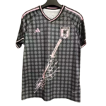 Japan national football team jersey with pink trim and floral sword graphic on the front