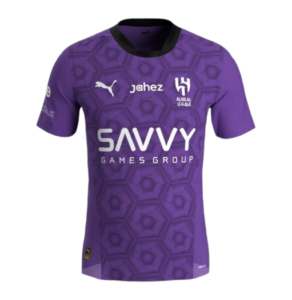 Front view of a purple esports jersey with a black collar and hexagonal pattern, featuring the Savvy Games Group logo on the chest and Puma logo nearby.