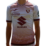 Male soccer player wearing a white maroon Torino FC jersey with Suzuki sponsor logo on the chest and Beretta patch on the left, standing facing forward.