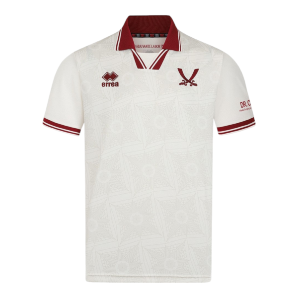 White polo shirt with maroon collar and sleeve trim, subtle geometric pattern, Errea logo on the left chest and a maroon team crest on the right chest.