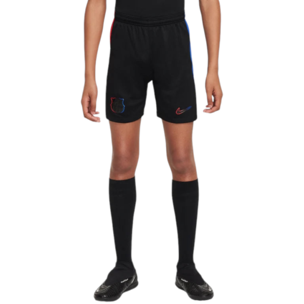 Male athlete wearing black soccer shorts with red/blue crest and Nike logo, black socks, and cleats against a white background.