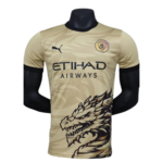 Beige Manchester City football jersey with Etihad Airways sponsor, black Puma logo, team crest, and a large dragon graphic on the front lower half.