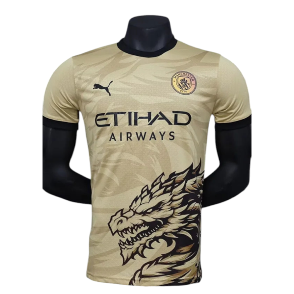 Beige Manchester City football jersey with Etihad Airways sponsor, black Puma logo, team crest, and a large dragon graphic on the front lower half.