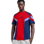 Man wearing a red and navy color-block short-sleeve T-shirt with a small logo on the chest.