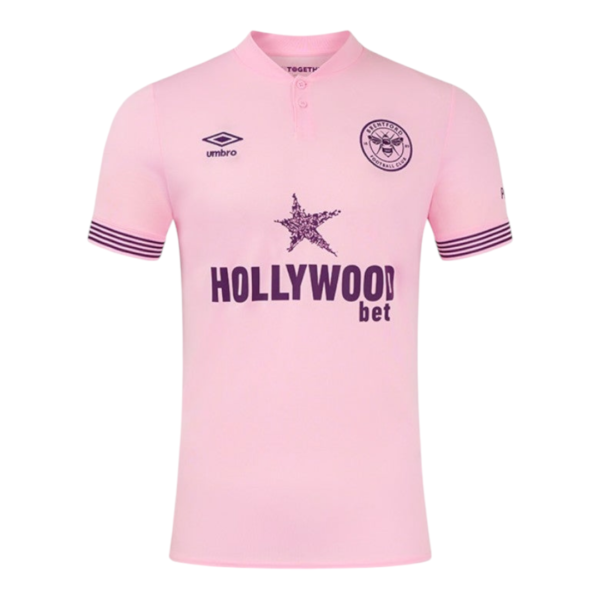 Pink football jersey with Hollywood.bet sponsor, Umbro logo on the left chest, club crest on the right, and dark striped sleeve cuffs.