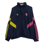 Navy windbreaker with color-block sleeves (yellow on the left, pink on the right), zip-front, Adidas logo on the chest and a pink horse crest on the other side.