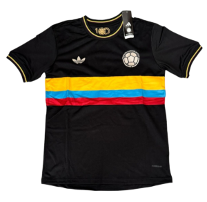 Black Colombia national team soccer jersey with yellow, blue, and red horizontal stripes across the midsection and Adidas logo.