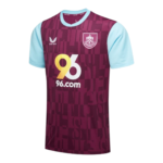 Maroon soccer jersey with light blue sleeves featuring the '96.com' sponsor and crest on the chest.