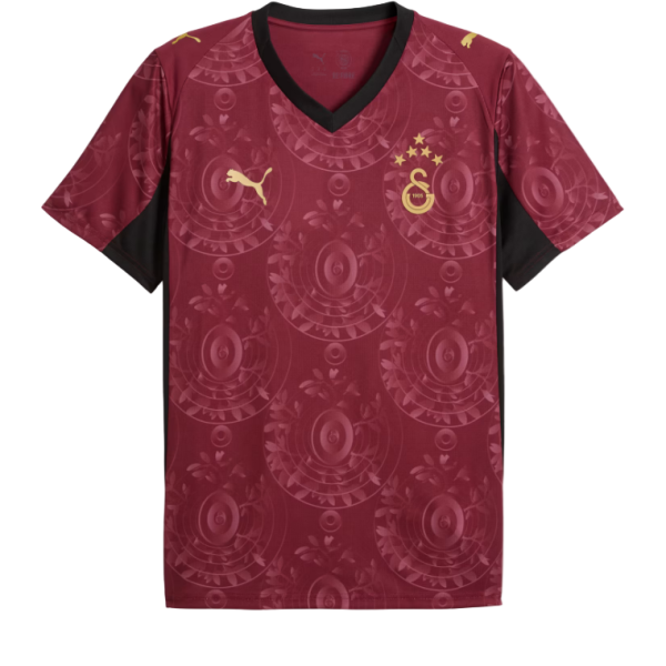 Maroon Galatasaray football jersey with black V-neck, Puma logo, and crest with stars.