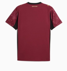 Q6 | UAE SPORT STORE Back view of a maroon athletic jersey with black side panels and patterned sleeves; small gold text near the collar reads 'MEKTEB I SULTANI'.