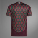 Qa6R42lUIegF0xT | UAE SPORT STORE Back view of a maroon shirt with a teal and green repeated scalloped pattern across the fabric.