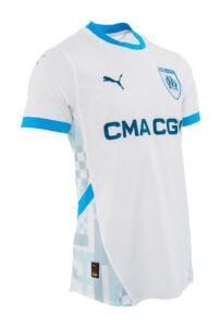 White Olympique de Marseille football jersey with blue trim, Puma logo, club crest, and CMACG sponsor on the chest.