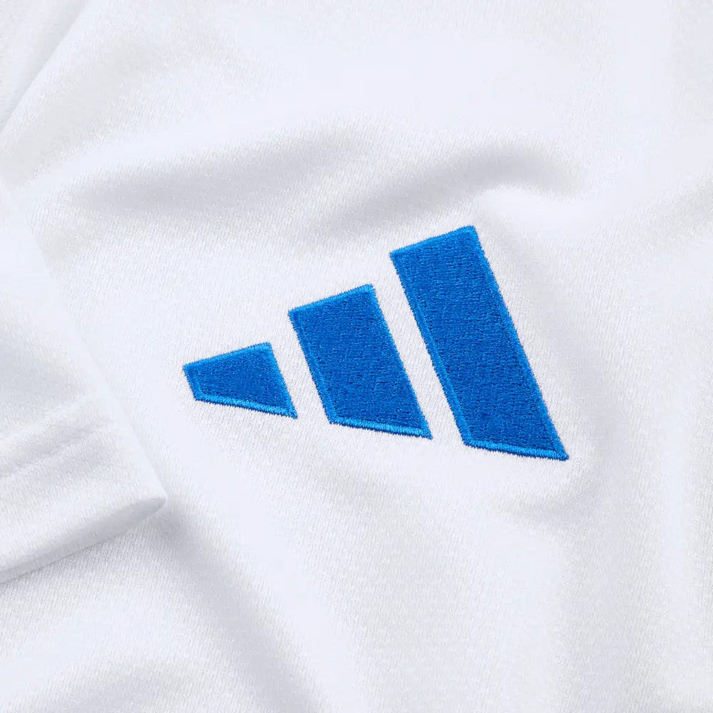 REGGKswFhVUeWux | UAE SPORT STORE White fabric with blue three-bar Adidas logo embroidered on it.