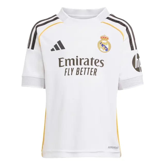 RMCFIO0043_01 | UAE SPORT STORE White Real Madrid soccer jersey featuring the club crest, Adidas logo, and Emirates Fly Better sponsor; black stripe accents and yellow piping on the shoulders and sides.