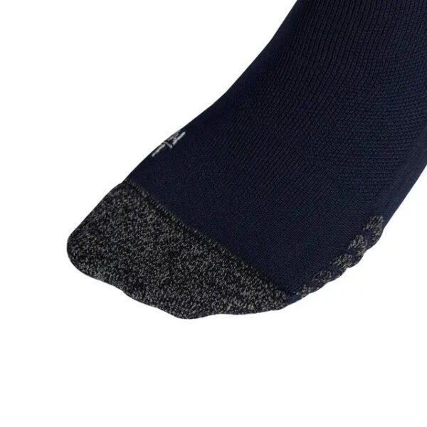 Close-up of a navy sock showing a gray reinforced toe cap in the toe area.