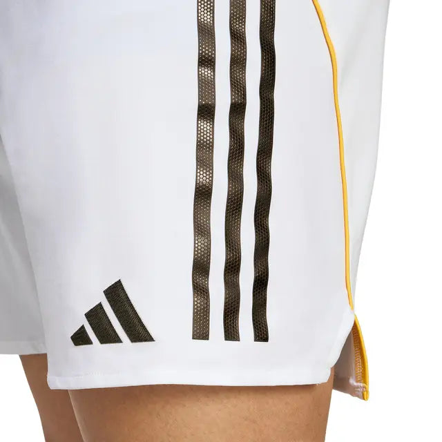RMCFMP0301_02 | UAE SPORT STORE White athletic shorts featuring the black Adidas logo and three vertical stripes along the side, with a yellow zipper on the side seam.