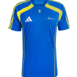 Blue athletic jersey with yellow piping, white Adidas logo, and a small chest crest.