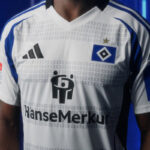 White soccer jersey with blue stripes, featuring the diamond crest and star on the chest, Adidas logo, and 'HanseMerkur' sponsor text.
