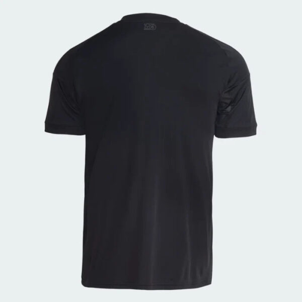Back view of a plain black short-sleeve T-shirt with rolled cuffs and no visible design.