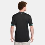 SSS2-NKFN8780_322_196976453442_2_d86acda5-7a1b-47b3-9970-a2f25fc8eb36 | UAE SPORT STORE Back view of a person wearing a black athletic jersey with teal trim on the sleeves and a small white logo at the upper back against a light-gray background.